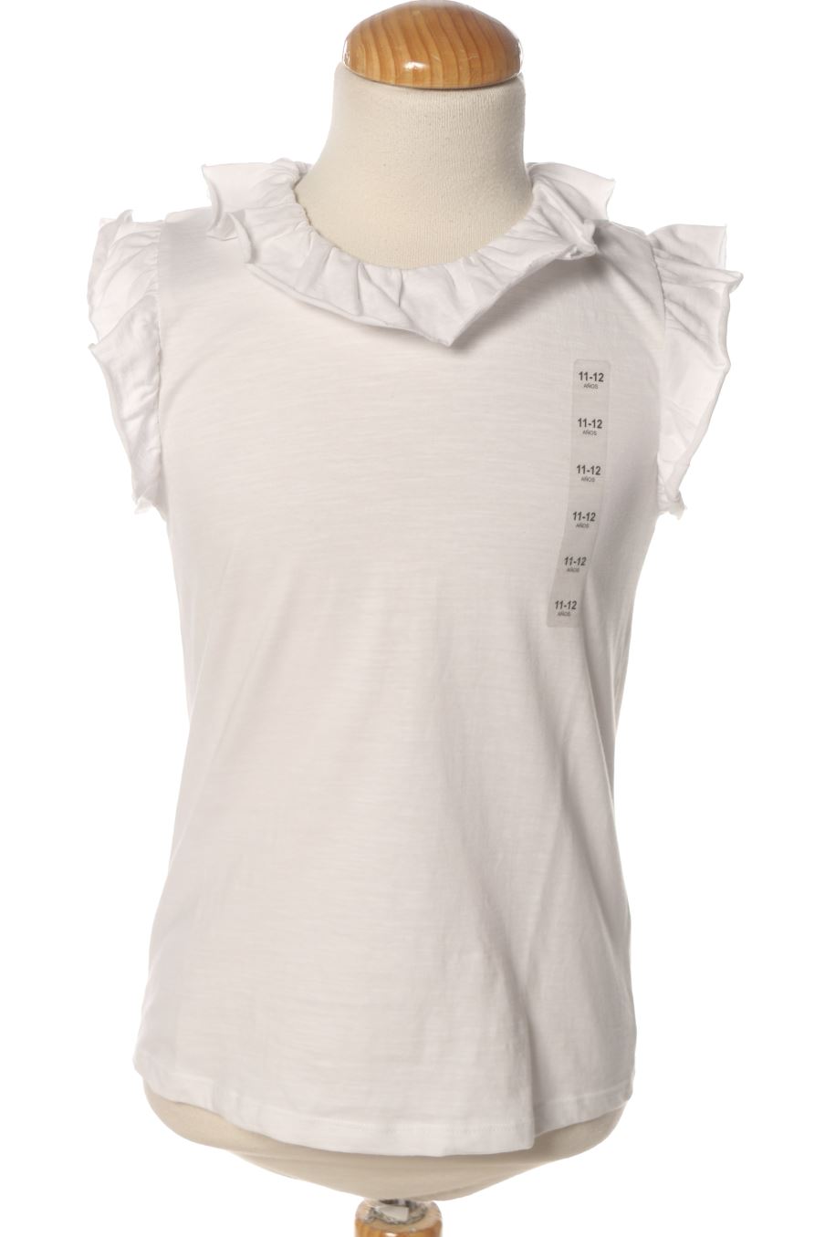 T-shirt Unit de la taille 11 ans avec une étiquette