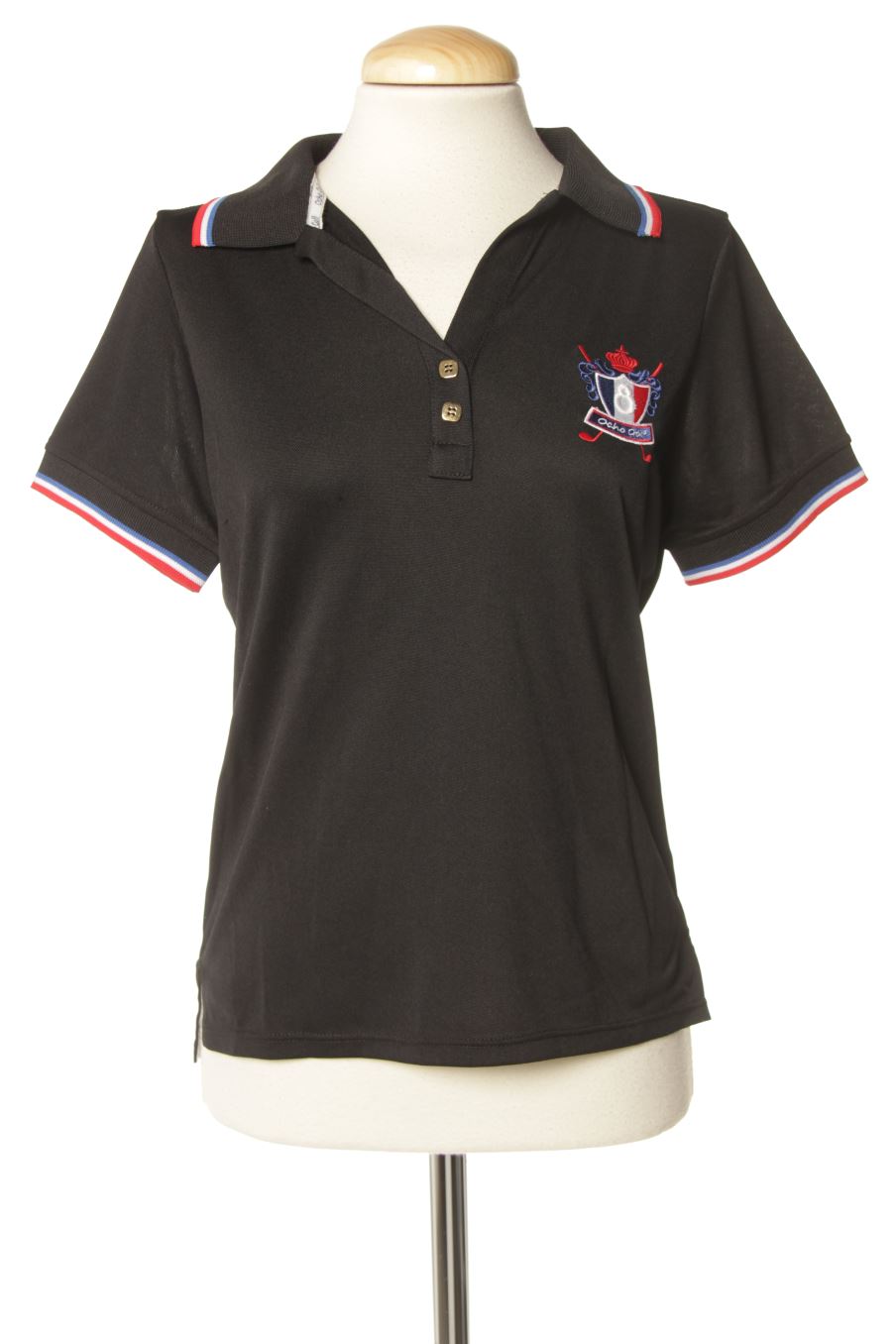Polo de Ocho Golf de la talla M, de color negro