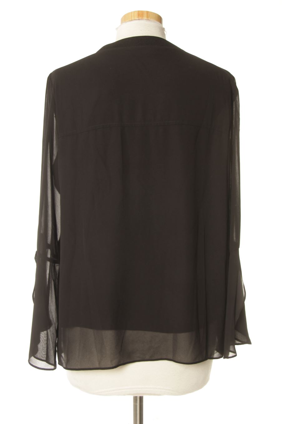 Blusa de manga larga de Zara de la talla M, de color negro