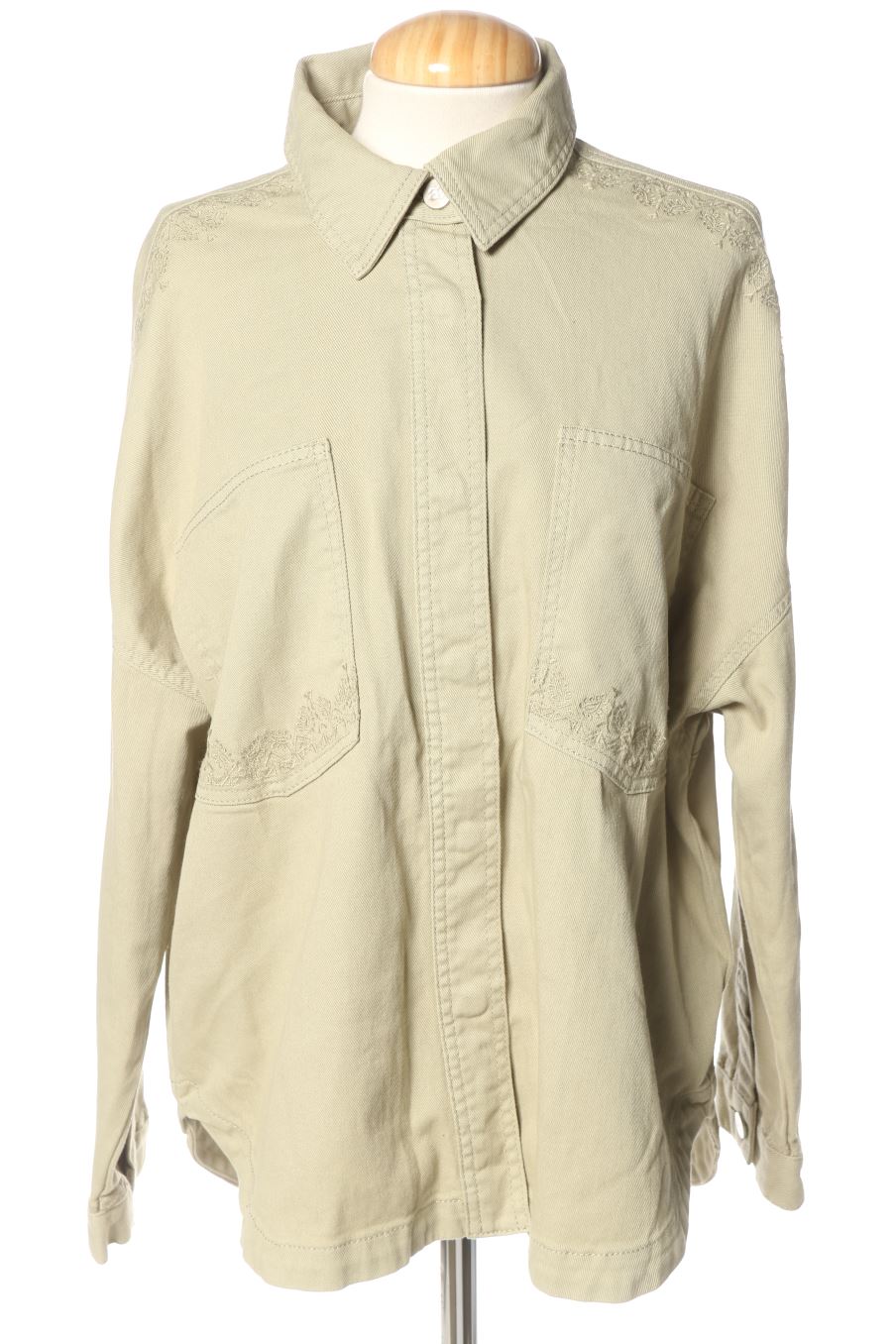 Blouson almé de la taille 44, de couleur vert de denim