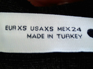 Pantalón de Zara de la talla XS, de color gris
