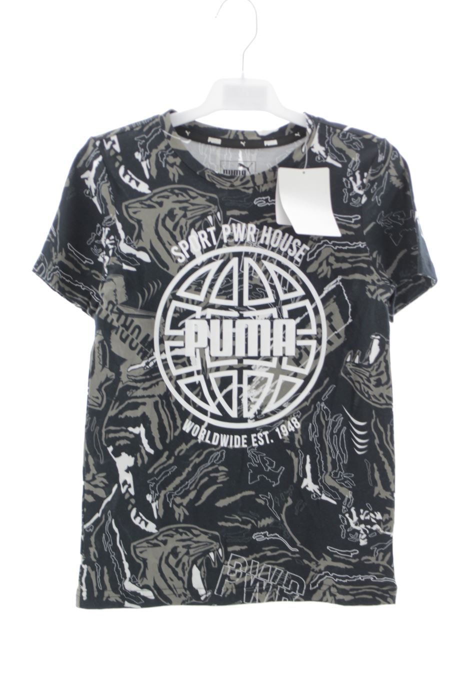 T-shirt Puma de la taille 9 ans avec une étiquette