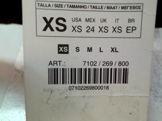Pantalón de Zara de la talla XS, de color negro de sintético