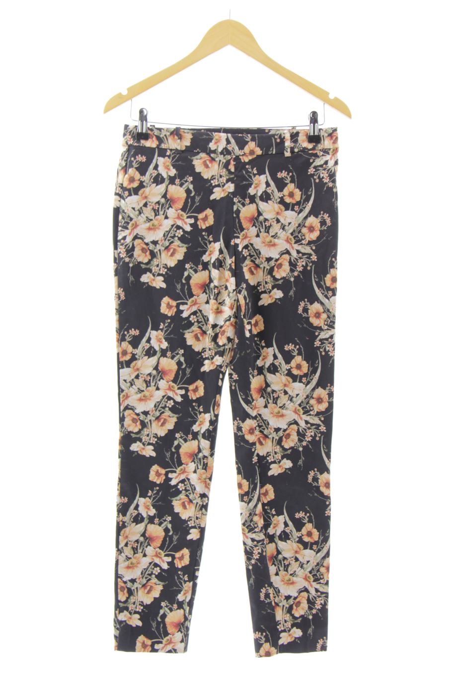 Pantalón de H&M de la talla 38, de color flores