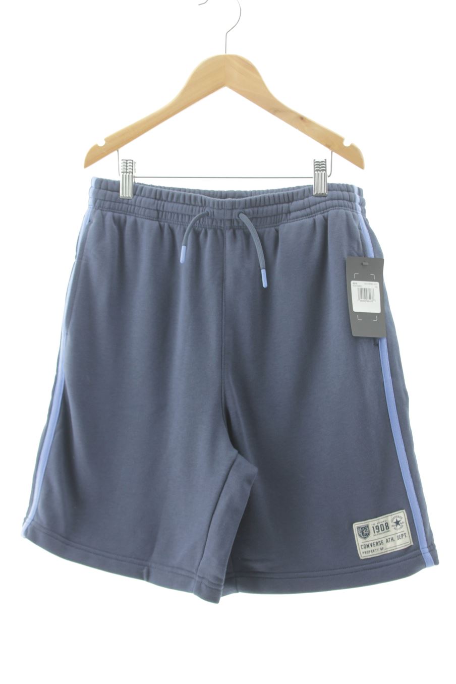 Pantalon Sport Converse de la taille 13 ans avec une étiquette