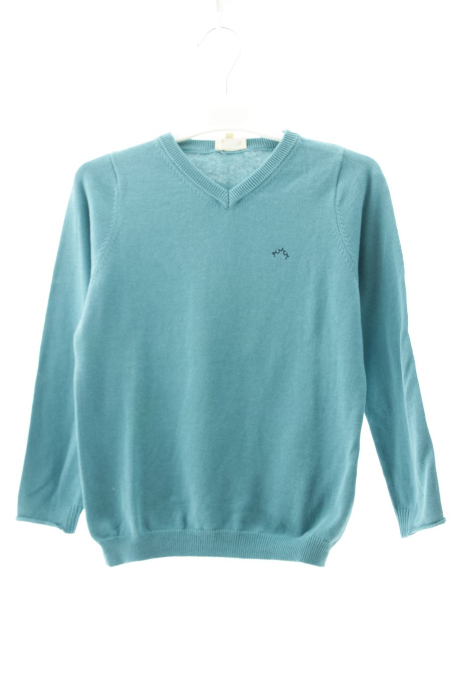 Pull Nanos de la taille 8 ans avec une étiquette