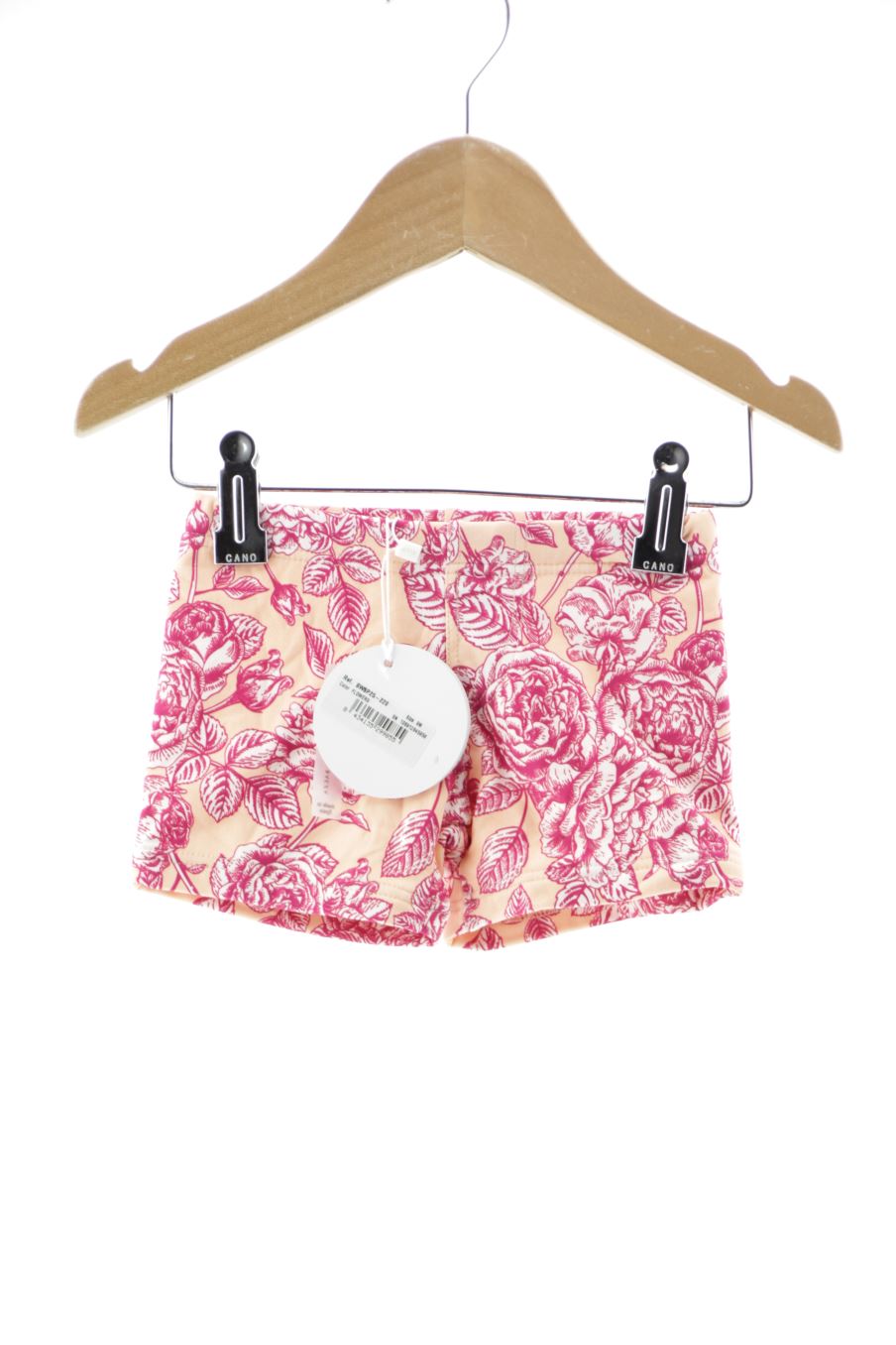 Maillot de bain Bonnet a Pompon de la taille 9 mois avec une étiquette