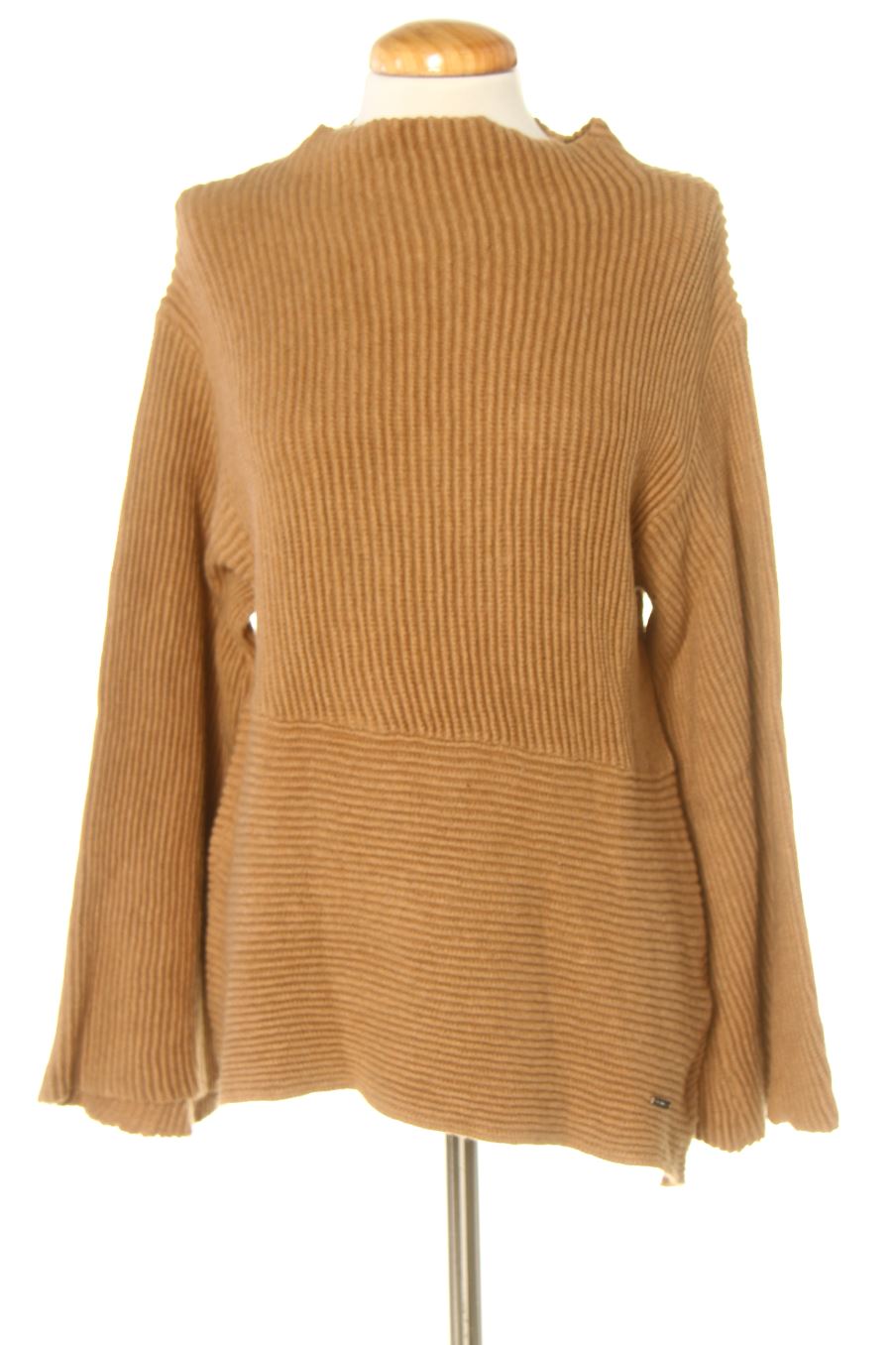 Jersey de Pedro del Hierro de la talla M, de color marrón