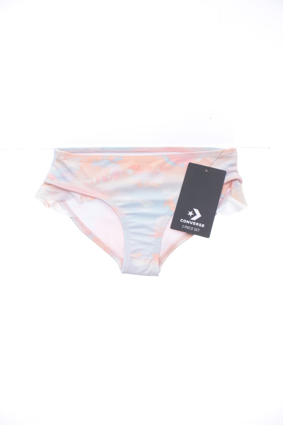 Maillot de bain Converse de la taille 4 ans avec une étiquette