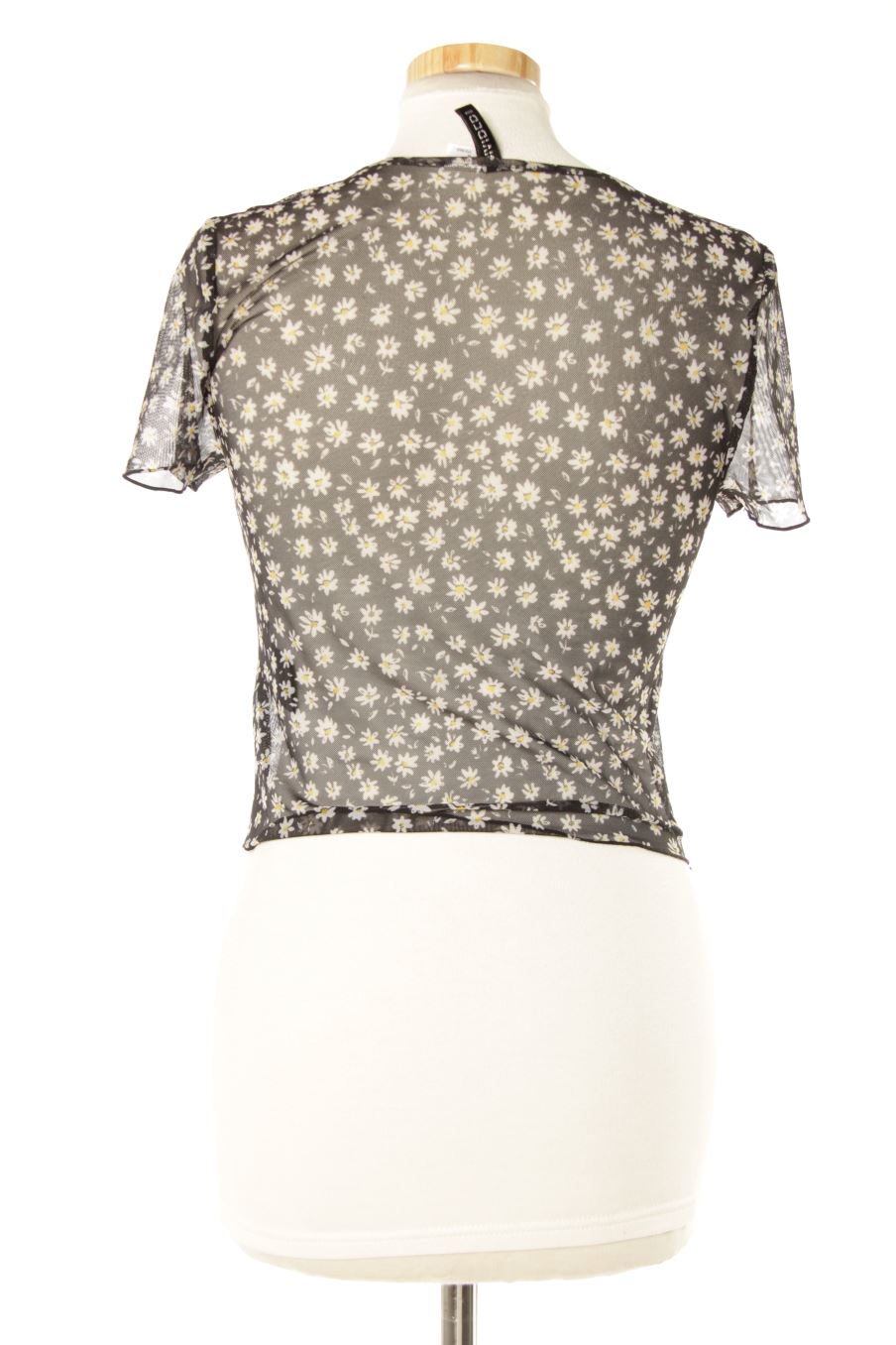 T-shirt H&M de la taille M, de couleur fleurs