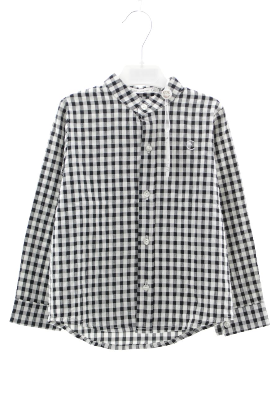 Chemise manches longues Eve children de la taille 4 ans avec une étiquette