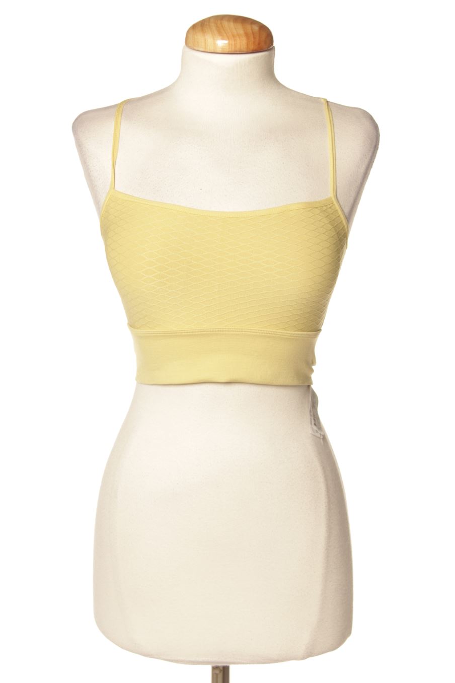 Top deportivo de Oysho de la talla S, de color amarillo