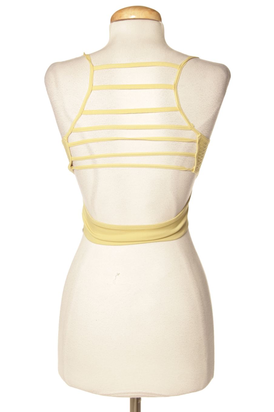 Top deportivo de Oysho de la talla S, de color amarillo