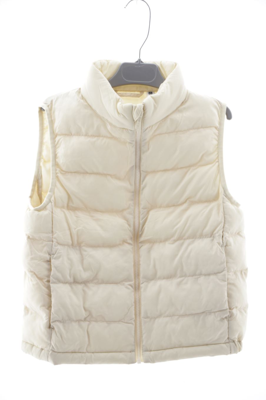 Chaleco de abrigo de Uniqlo de la talla 7 años de segunda mano