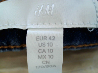 Jeans H&M de la taille 42, de couleur bleu de denim