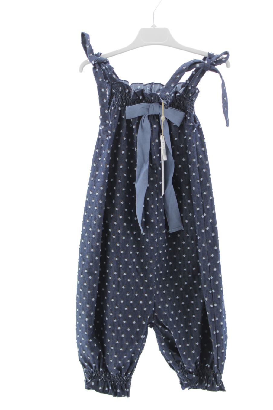 Combi Eve children de la taille 10 ans avec une étiquette