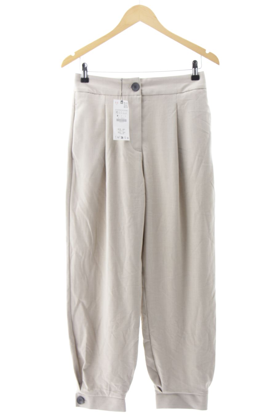 Pantalón de Zara de la talla XS, de color beige