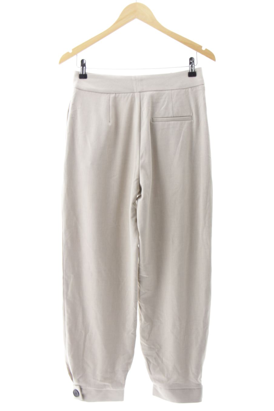 Pantalón de Zara de la talla XS, de color beige