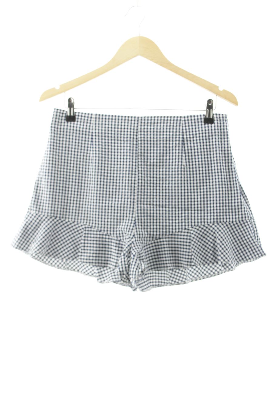 Pantalón corto de Zara de la talla L, de color cuadros