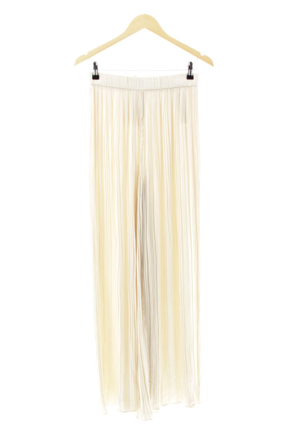 Pantalones de Zara de la talla XS, de color beige