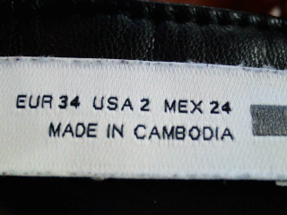 Pantalón de Zara de la talla 34, de color negro de sintético