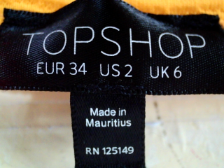 Jupe Topshop de la taille 34, de couleur orange
