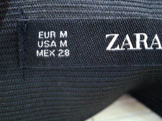 Pantalon Zara de la taille M, de couleur noir de synthétique