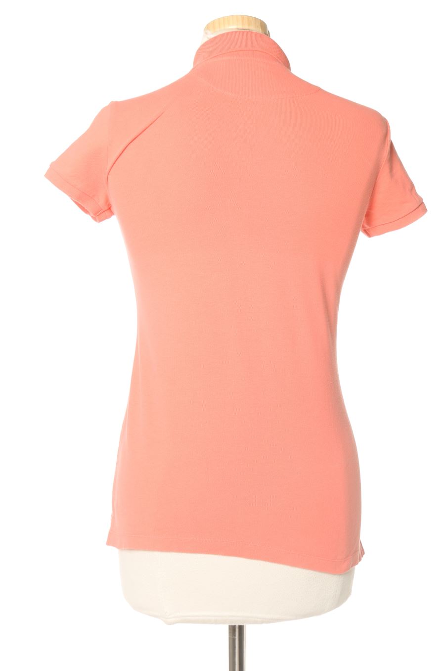 Polo Easy wear de la taille XS, de couleur corail