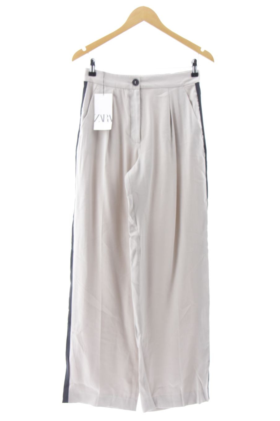 Pantalón de Zara de la talla XS, de color beige