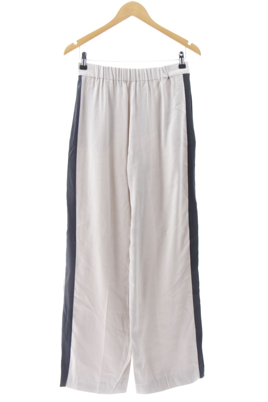 Pantalón de Zara de la talla XS, de color beige