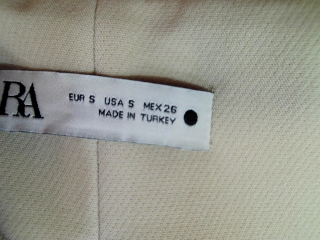 Pantalón de Zara de la talla S, de color beige