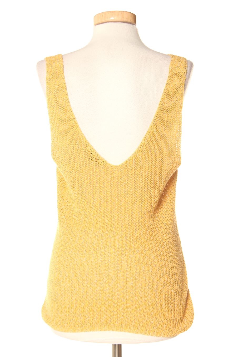 Top Caroll de la taille M, de couleur moutarde