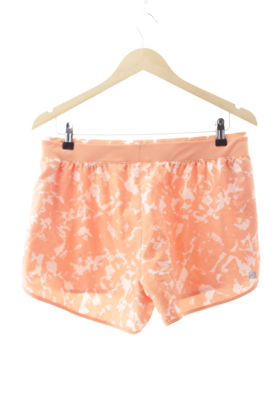 Pantalon corto de deporte de Domyos (DECATHLON) de la talla M, de color naranja