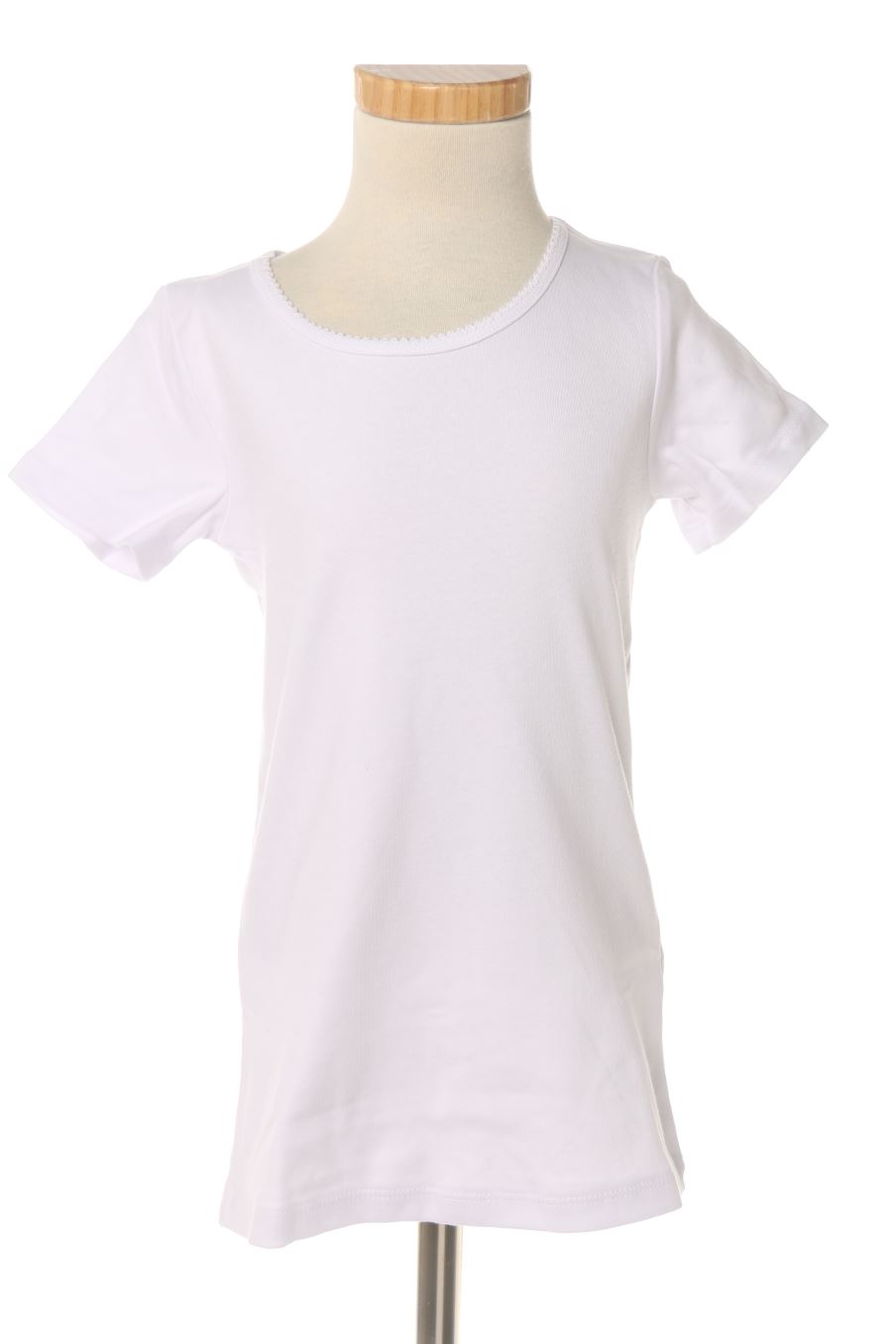T-shirt Unit de la taille 7 ans avec une étiquette
