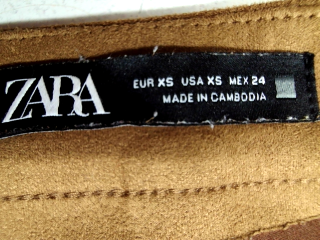 Pantalón de Zara de la talla XS, de color marrón