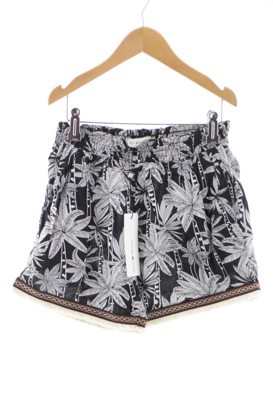 Short Mini Molly de la taille 10 ans avec une étiquette