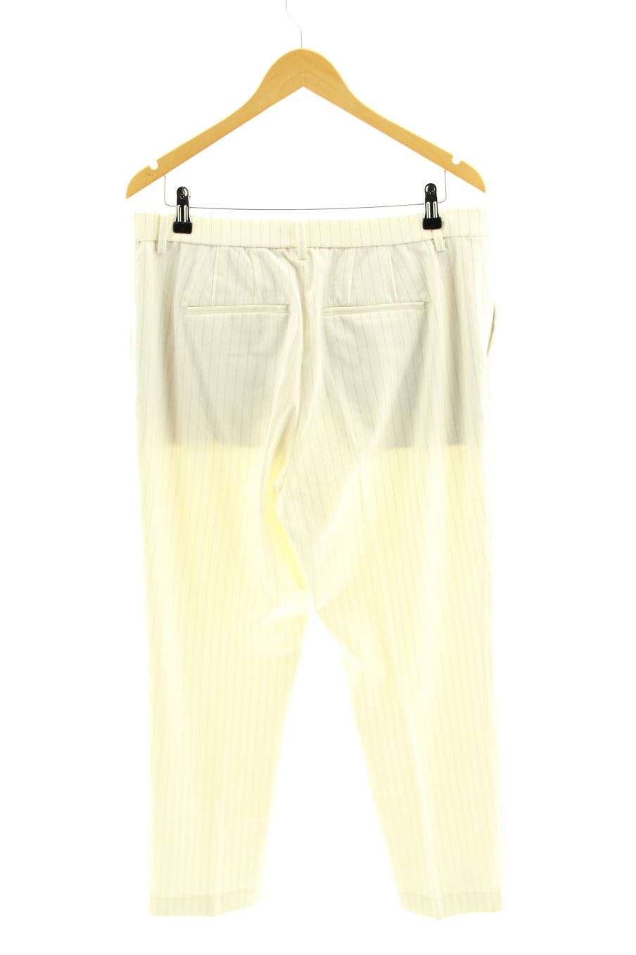 Pantalon Uniqlo de la taille 44, de couleur beige