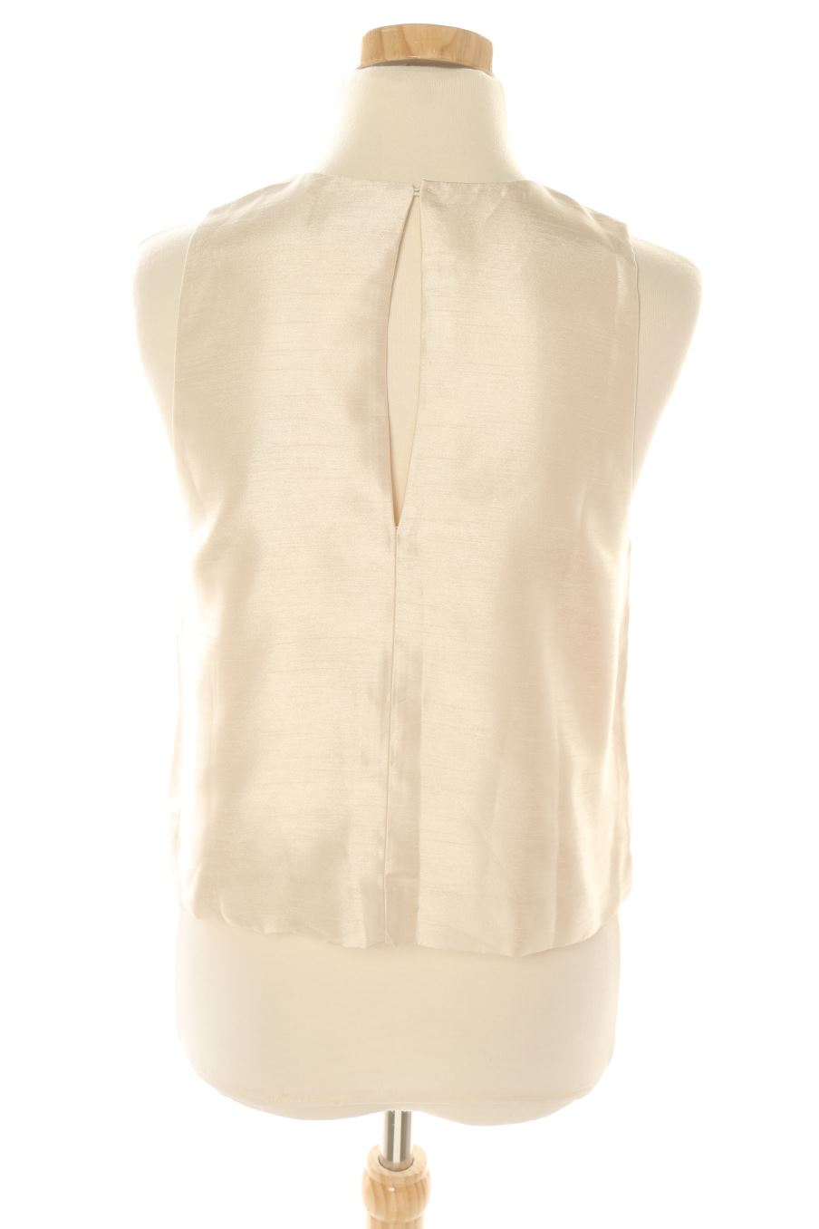Top de H&M de la talla 36, de color beige