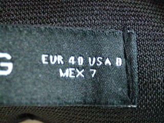 Pantalón de Mango de la talla 40, de color gris