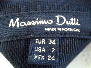 Falda de Massimo Dutti de la talla 34, de color negro