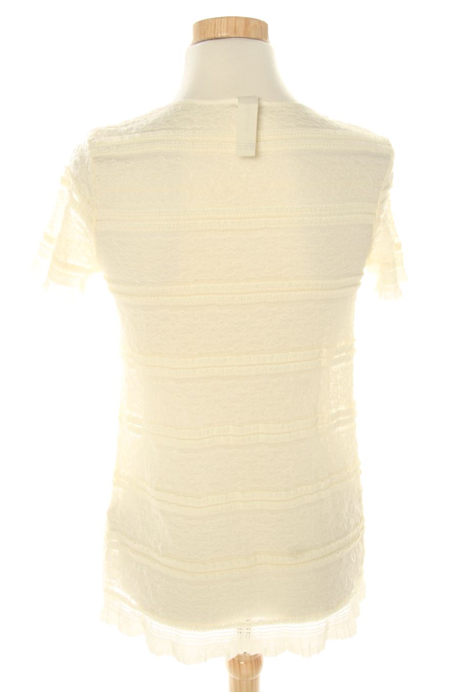 Top de Zara de la talla M, de color beige