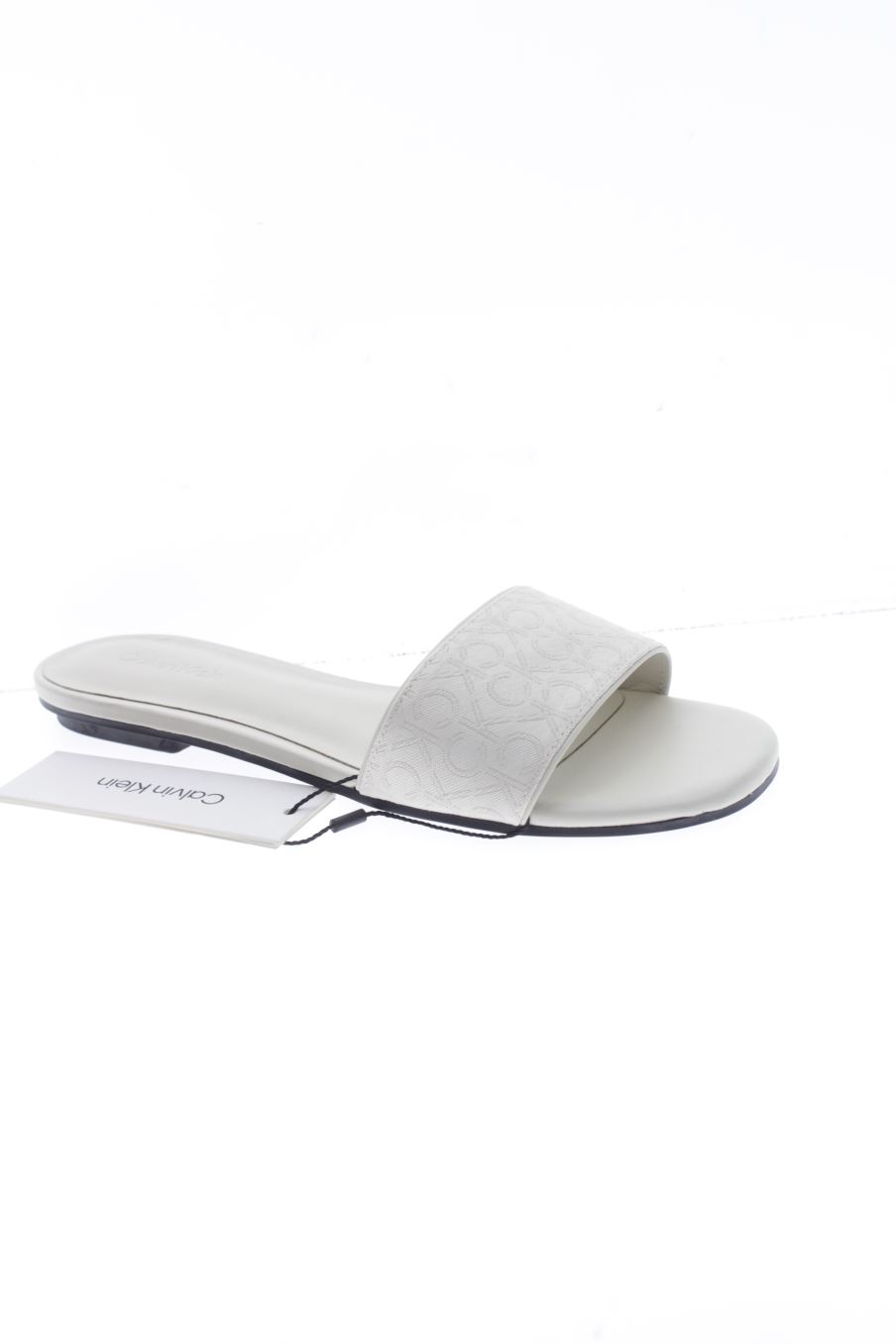 Sandales plates de Calvin Klein de la taille 36, de couleur beige de