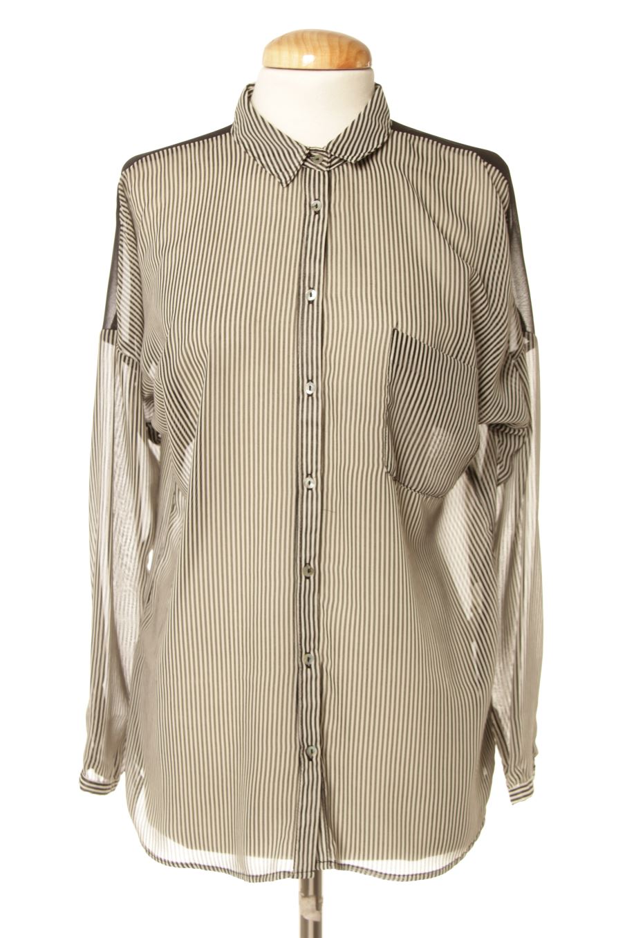 Camisa de Trafaluc de la talla XS, de color rayas