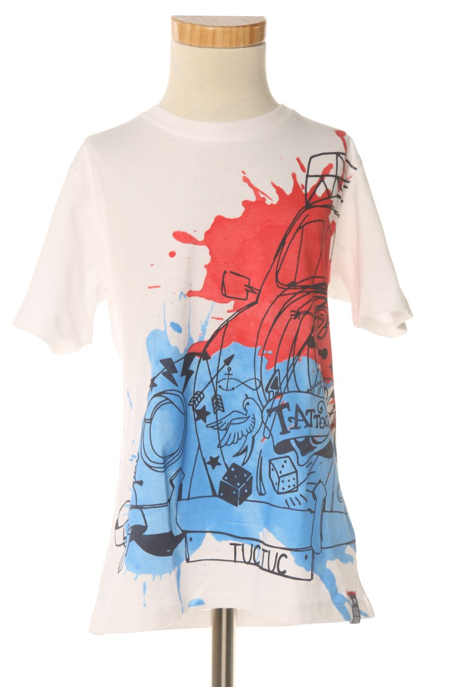 T-shirt Tuc Tuc de la taille 7 ans avec une étiquette