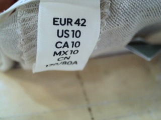 Pantalón de H&M de la talla 42, de color gris