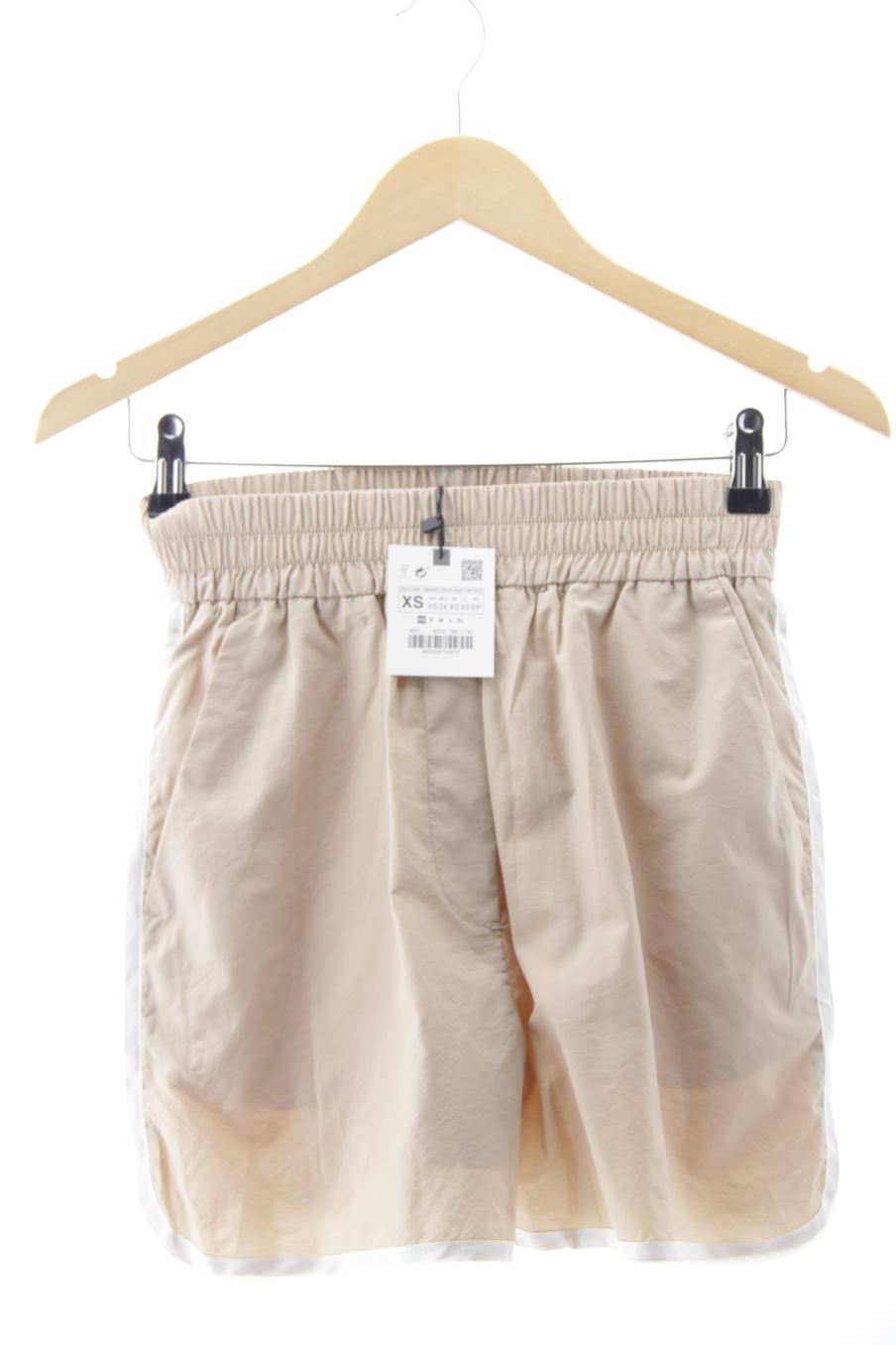 Pantalon corto de deporte de Zara de la talla XS, de color beige