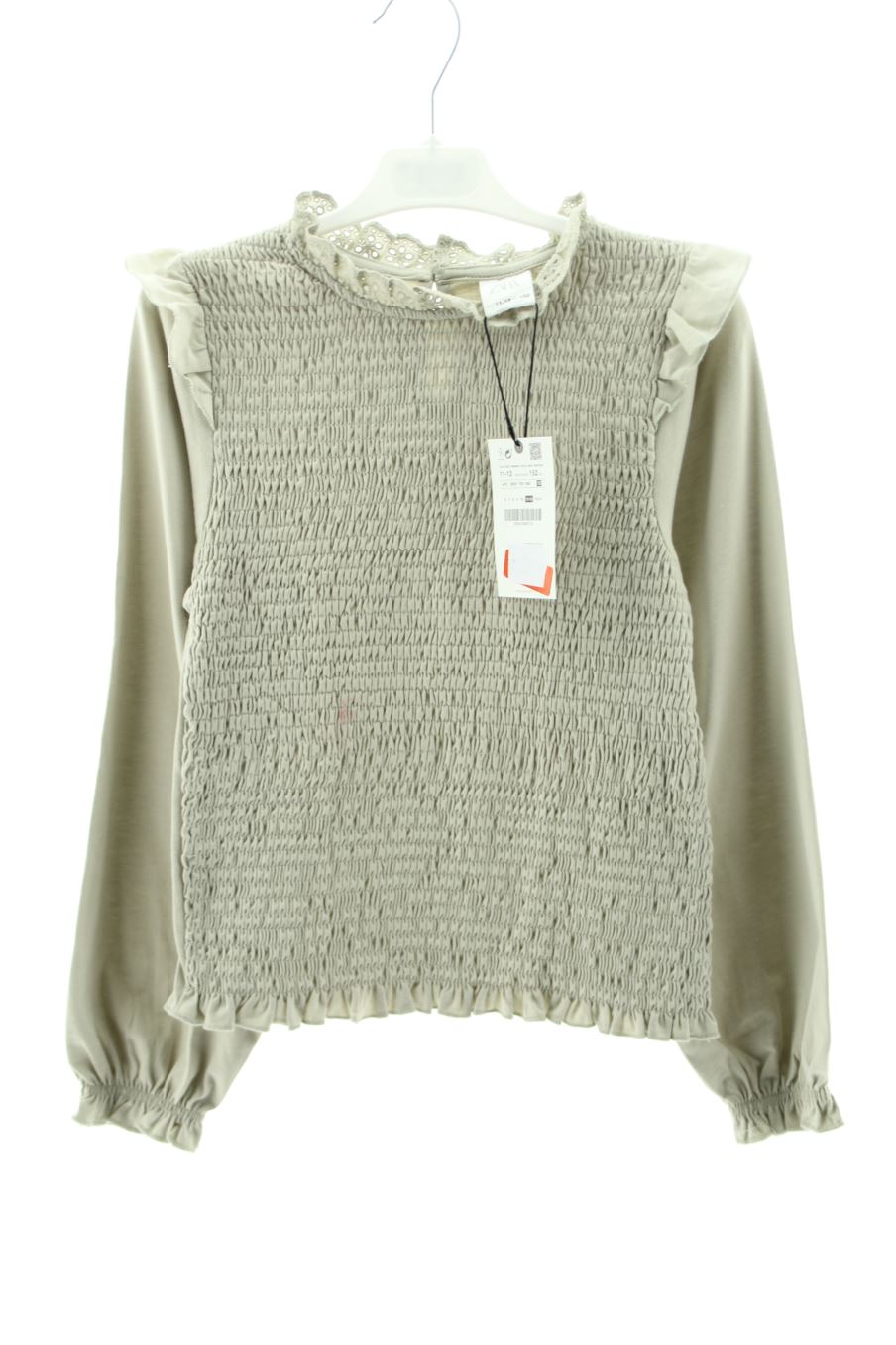 T-shirt manches longues Zara de la taille 11 ans avec une étiquette