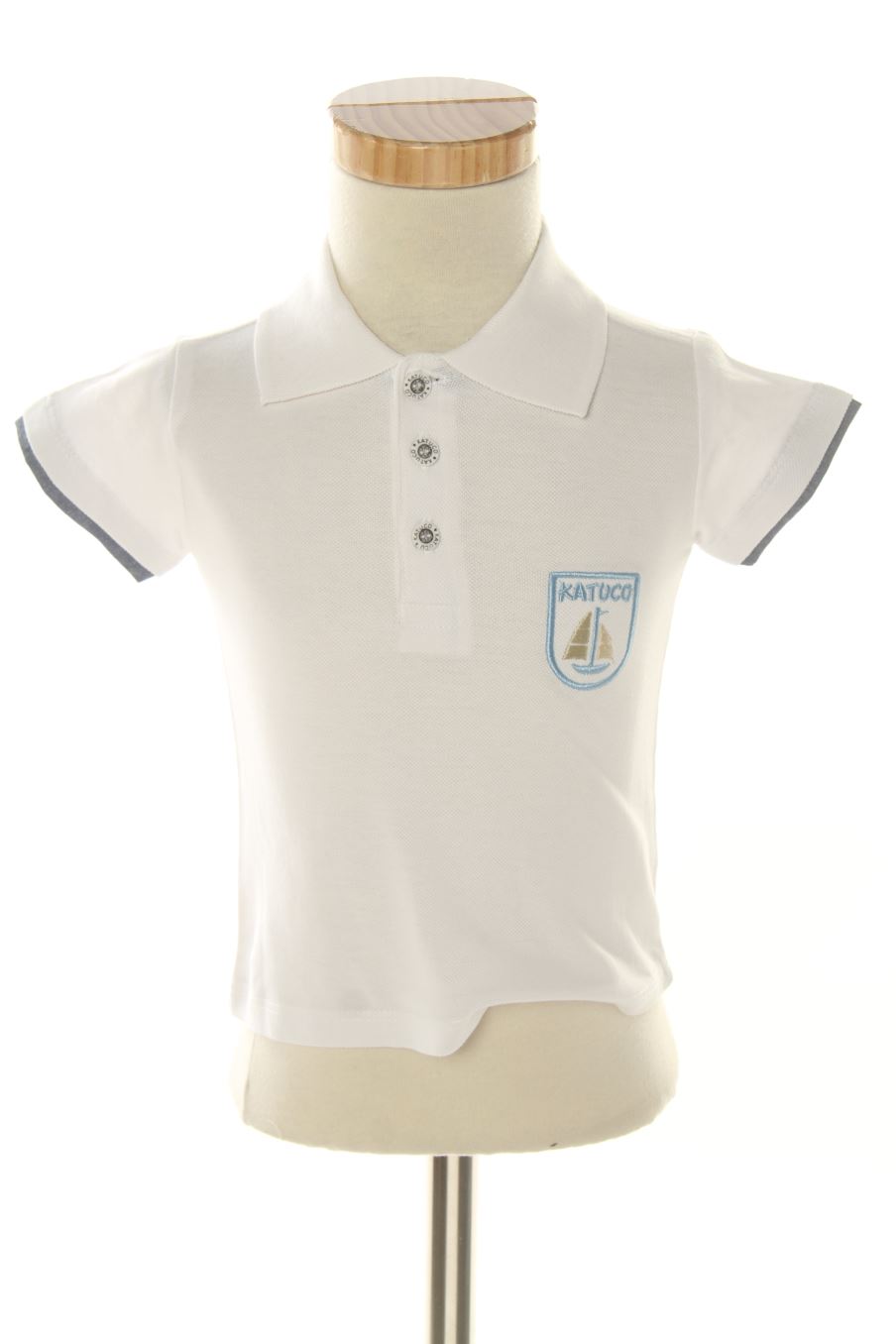 Polo Katuco de la taille 6 mois avec une étiquette