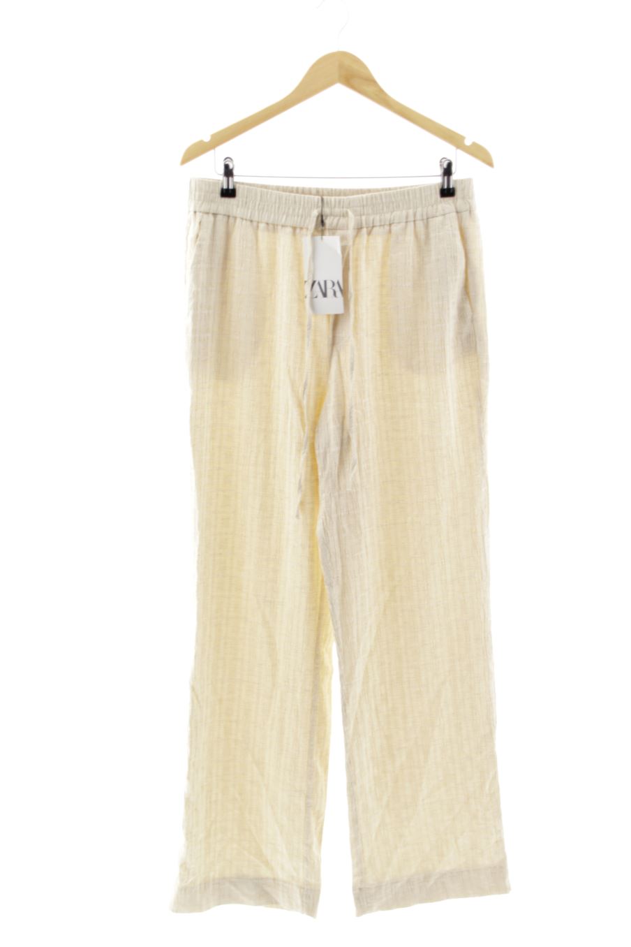 Pantalones de Zara de la talla L, de color beige