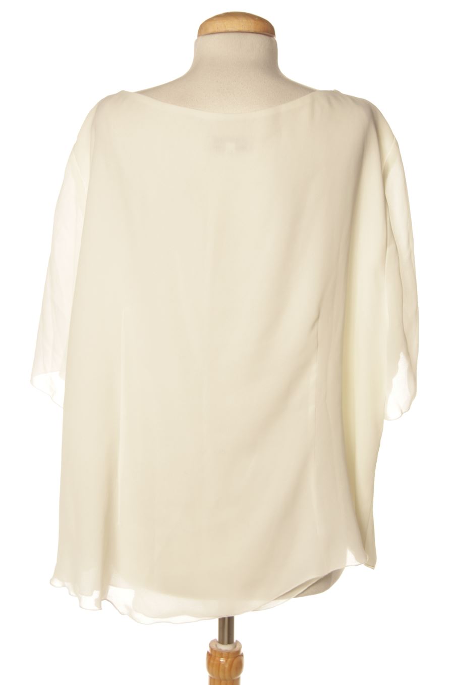 Blusa de manga corta de El Corte Ingles de la talla 58, de color beige
